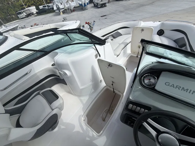 Slide: The Image of Interior of a 2020 Hurricane 2400 SD boat with Garmin display. - 21
