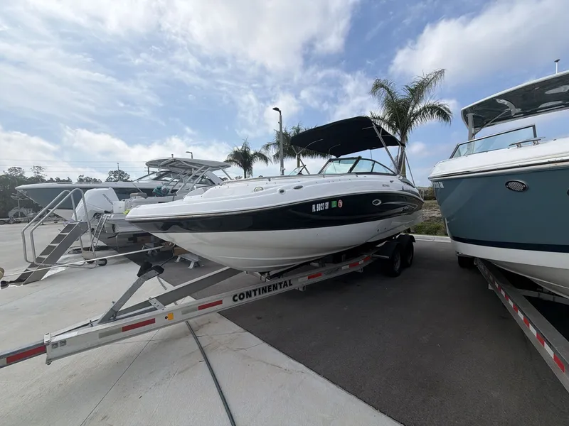 Slide: The Image of 2020 Hurricane 2400 SD boat on trailer outdoors. - 3