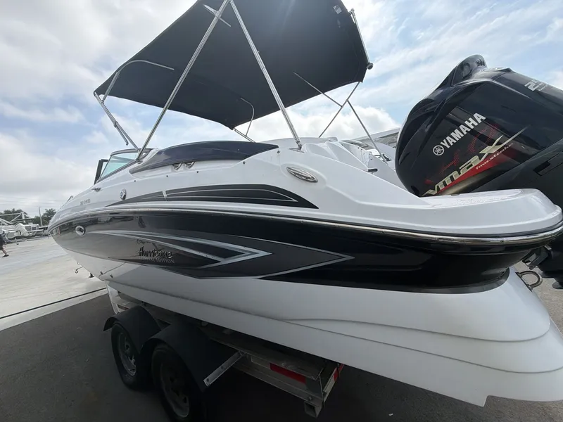 Slide: The Image of 2020 Hurricane 2400 SD boat with Yamaha engine, side view. - 4