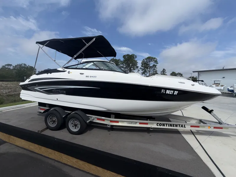 Slide: The Image of 2020 Hurricane 2400 SD boat on trailer, side view. - 9