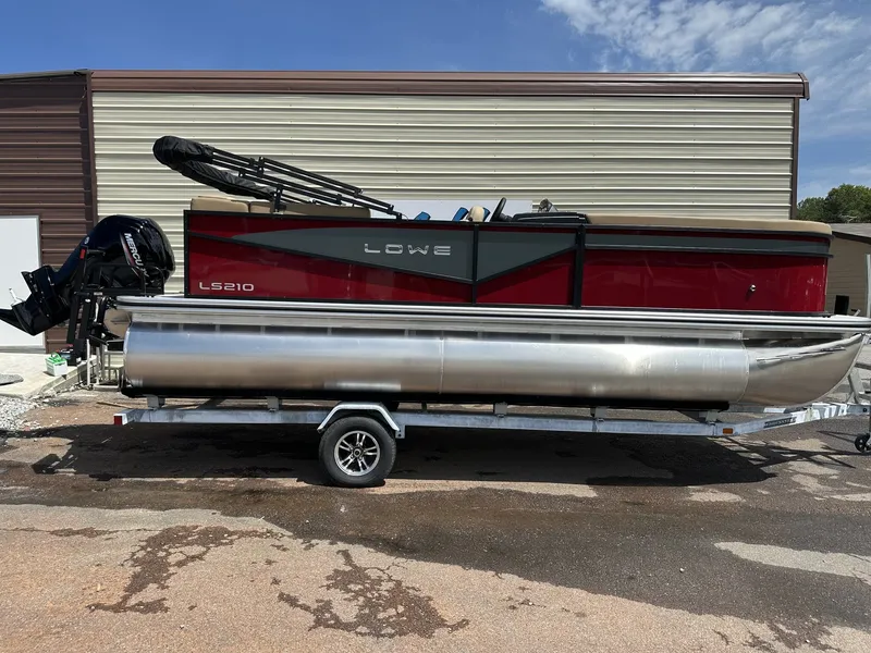 The Image of 2026 Lowe LS Walk Thru 210 pontoon boat on trailer. - 1
