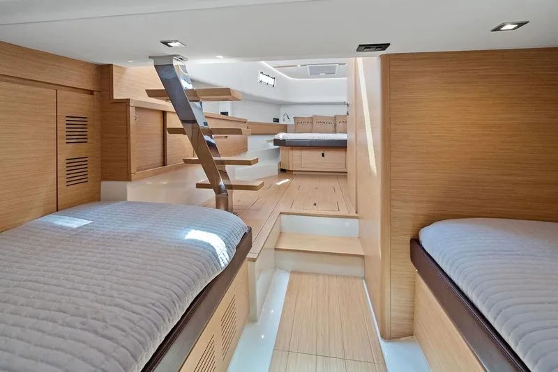 Slide: The Image of Luxurious interior of 2021 Pardo 43 yacht with modern wooden design and comfortable bedding. - 19