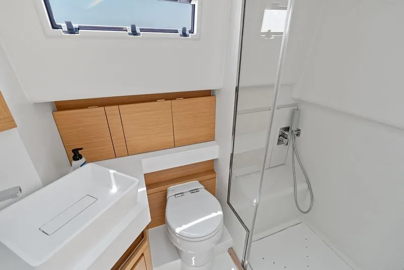 Slide: The Image of Modern bathroom interior on 2021 Pardo 43 yacht, featuring sleek design and wood accents. - 22