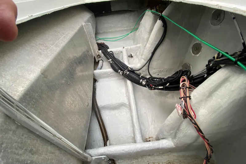 Slide: The Image of Interior view of 1994 Luhrs 32 Convertible boat wiring and compartments. - 45