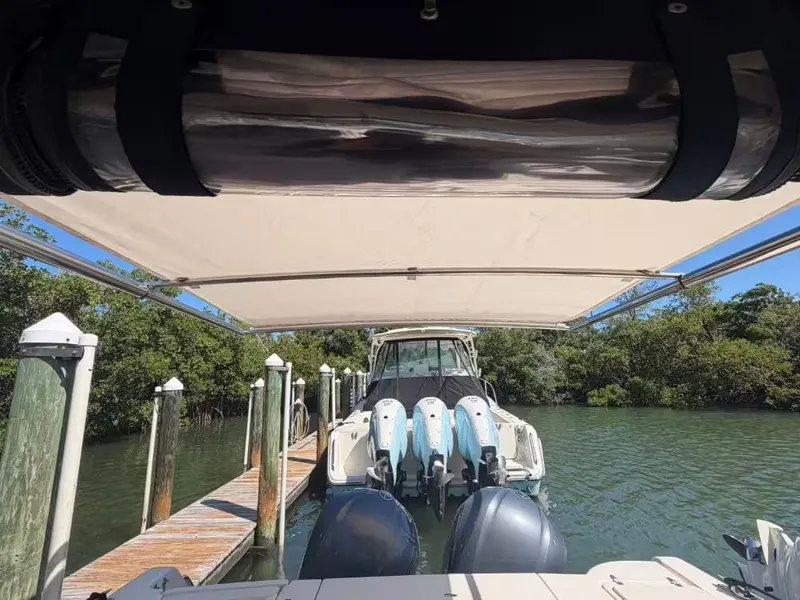 Slide: The Image of Grady-White Freedom 307 boat at dock, 2018 model. - 20