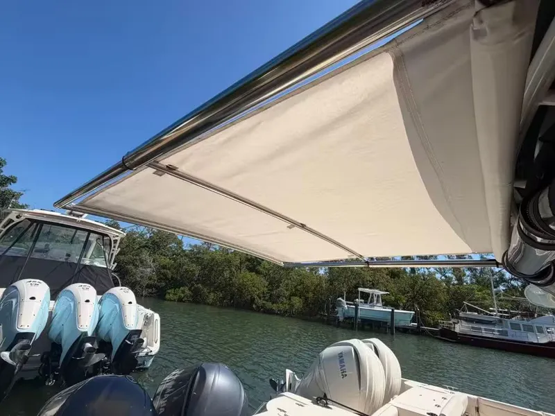 Slide: The Image of Grady-White Freedom 307 boat with sunshade, 2018 model. - 21