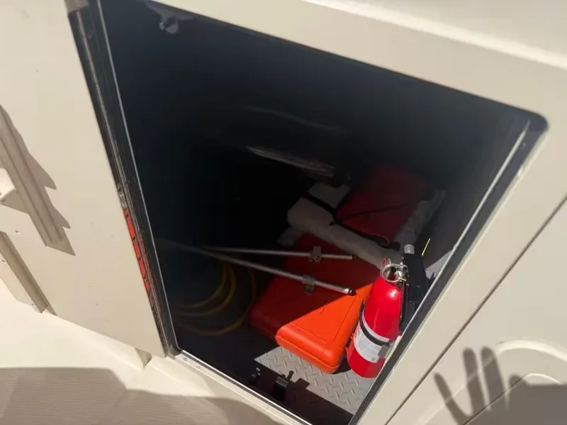 Slide: The Image of Storage compartment in 2018 Grady-White Freedom 307 boat. - 24