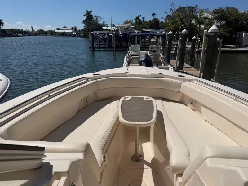 Slide: The Image of 2018 Grady-White Freedom 307 boat docked with scenic water view. - 25