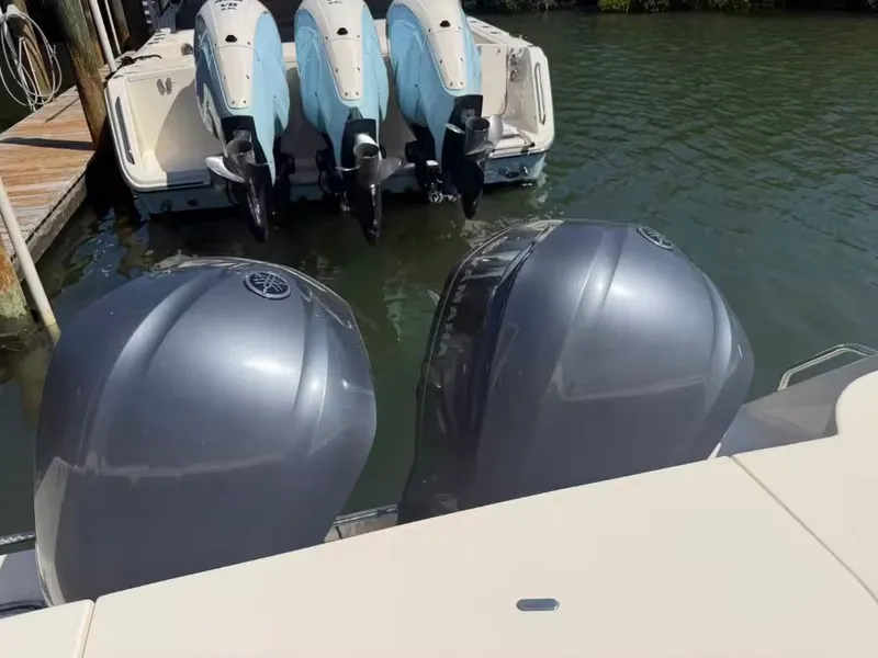 Slide: The Image of Grady-White Freedom 307 boat engines at dock, year 2018. - 5