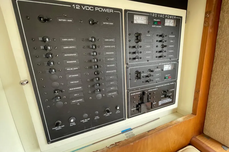 Slide: The Image of Electrical control panel on a 2002 Silverton 330 Sport Bridge boat. - 40