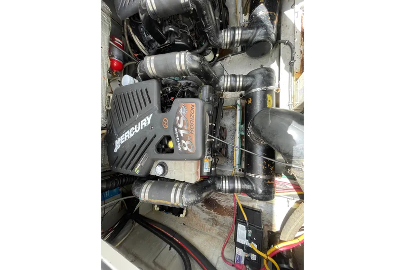 Slide: The Image of Engine compartment of a 2002 Silverton 330 Sport Bridge with Mercury 8.1S Horizon engine. - 42