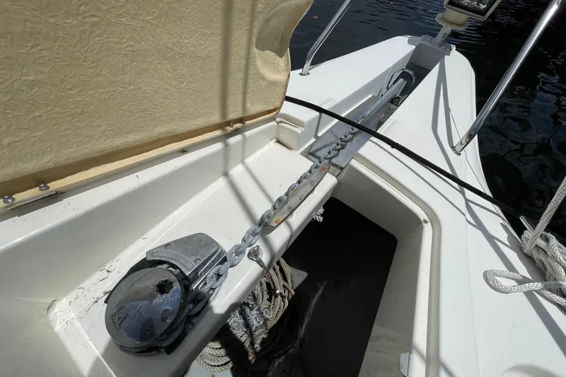 Slide: The Image of Anchor chain and winch on 2002 Silverton 330 Sport Bridge boat deck. - 6