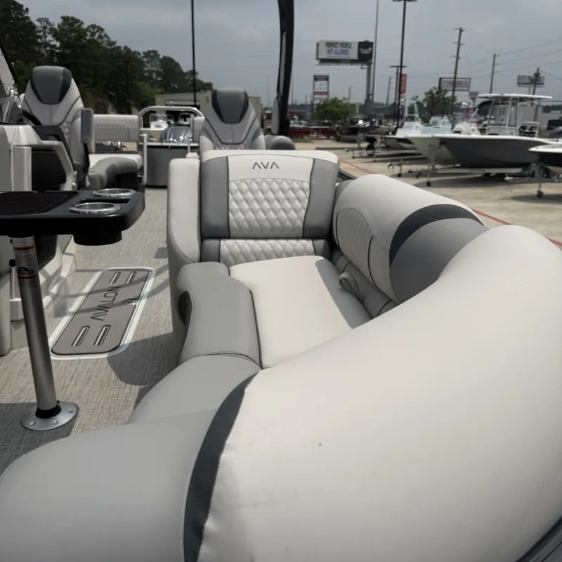 Slide: The Image of Luxurious seating in Avalon QLS25T Excalibur 2026 pontoon boat. - 18