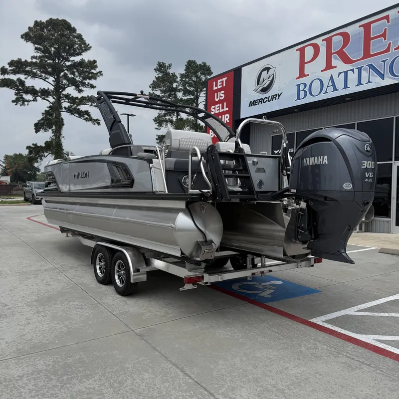 Slide: The Image of 2026 Avalon QLS25T Excalibur boat with Yamaha engine on trailer. - 9