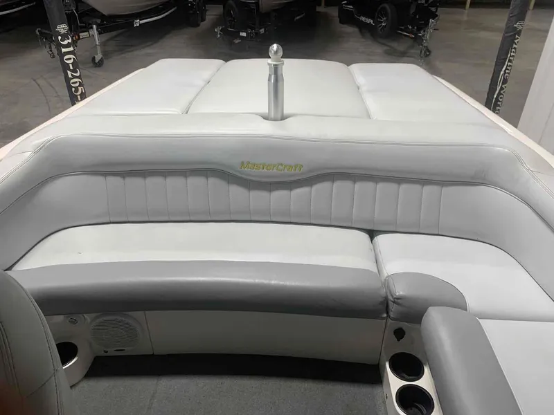 Slide: The Image of Interior of a 2003 MasterCraft X2 boat with gray seating. - 5