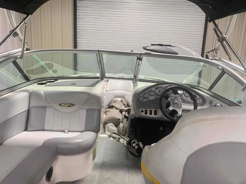 Slide: The Image of Interior of a 2003 MasterCraft X2 boat with gray seating. - 6