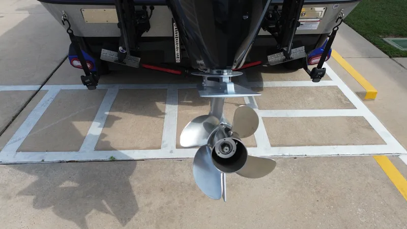 Slide: The Image of Rear view of a Vexus DVX22S boat, propeller visible. - 25