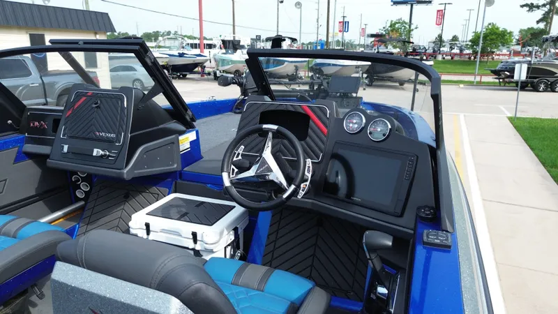 Slide: The Image of Interior view of 2025 Vexus DVX22S boat with modern features. - 27