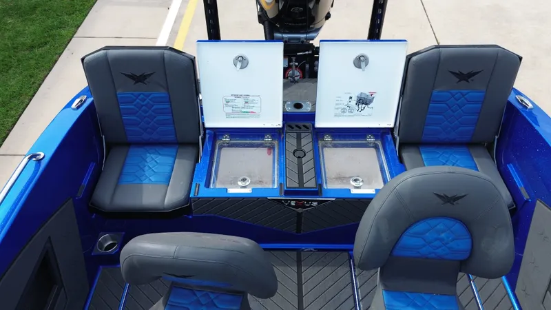 Slide: The Image of Interior of 2025 Vexus DVX22S with blue and gray seating. - 32