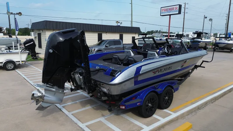 Slide: The Image of 2025 Vexus DVX22S boat on trailer outdoors. - 6