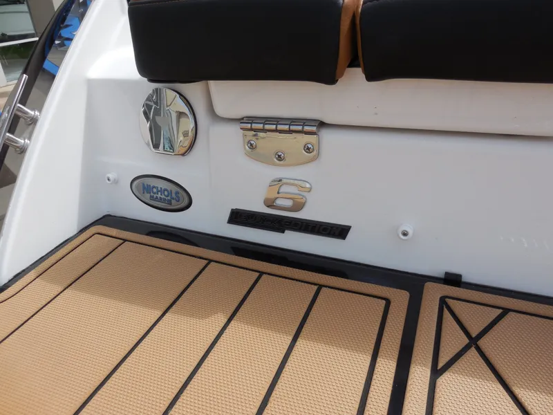 Slide: The Image of 2026 Chaparral SSX 6 boat rear with logo and flooring. - 25