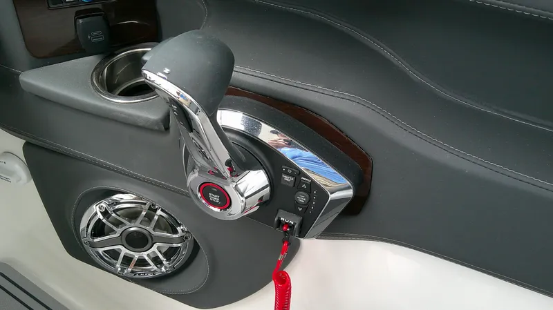 Slide: The Image of Interior view of Chaparral GTS 28 2026 boat controls. - 17
