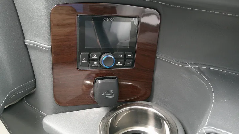 Slide: The Image of 2026 Chaparral GTS 28 interior featuring Clarion control panel. - 18