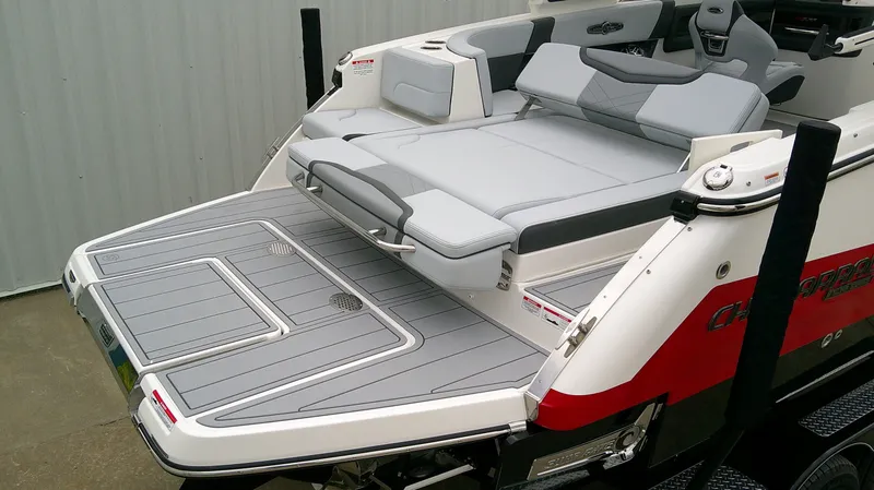 Slide: The Image of 2026 Chaparral GTS 28 boat with gray upholstery and lounging area. - 9