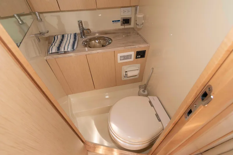 Slide: The Image of 2020 Chris-Craft Corsair 34 bathroom with modern fixtures and compact design. - 17