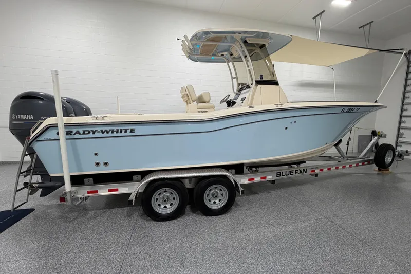 The Image of 2023 Grady-White Fisherman 257 boat on trailer in indoor showroom. - 0