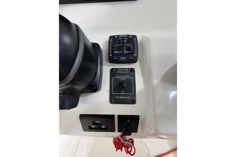 Slide: The Image of Control panel of 2023 Grady-White Fisherman 257 boat with anchor windlass switch. - 12