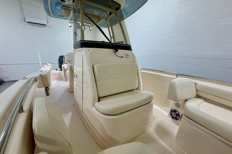 Slide: The Image of 2023 Grady-White Fisherman 257 boat interior with cushioned seating and modern design. - 20