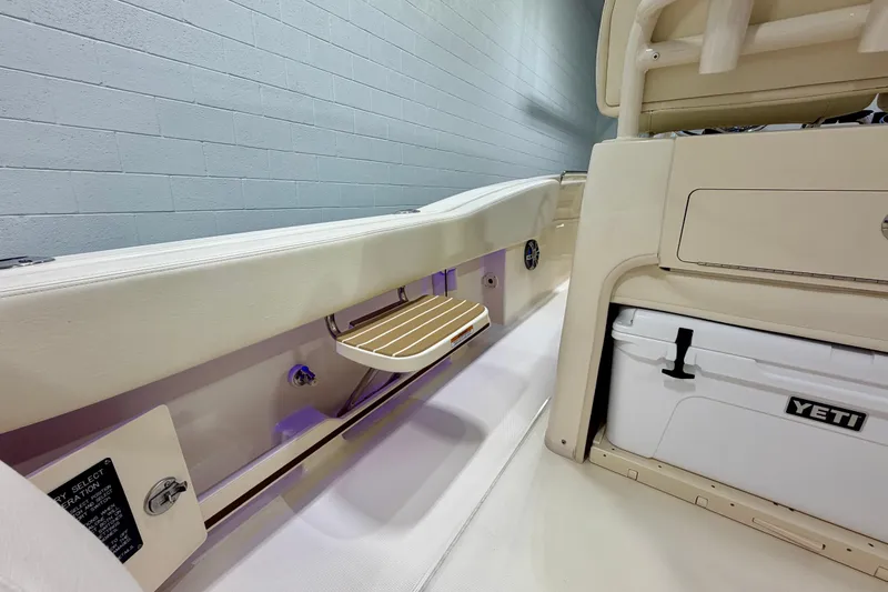 Slide: The Image of 2023 Grady-White Fisherman 257 interior with Yeti cooler and storage features. - 28