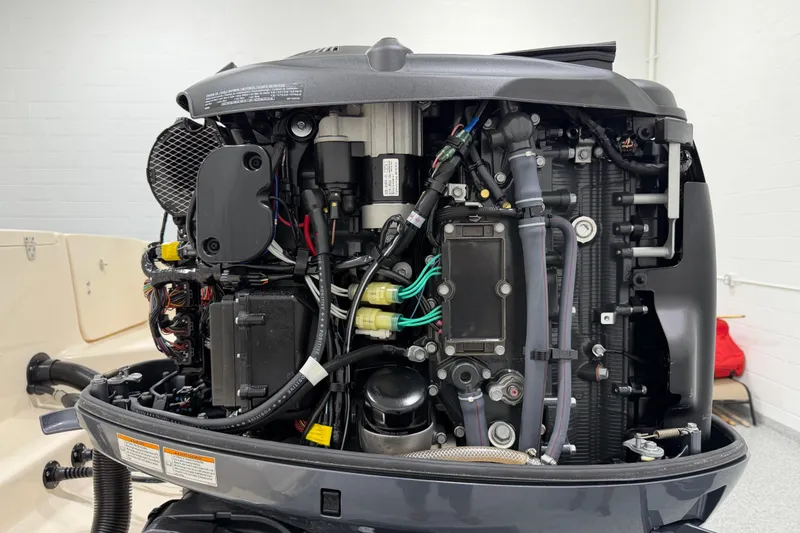 Slide: The Image of 2023 Grady-White Fisherman 257 boat engine, detailed view of internal components. - 35