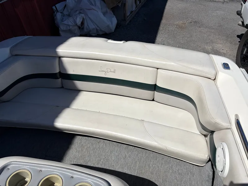 Slide: The Image of Interior of a 1997 MasterCraft Prostar 205 boat with white seating. - 15