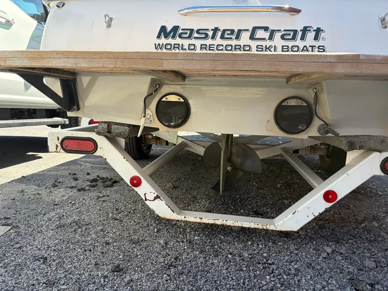 Slide: The Image of Rear view of a 1997 MasterCraft Prostar 205 on a trailer. - 17