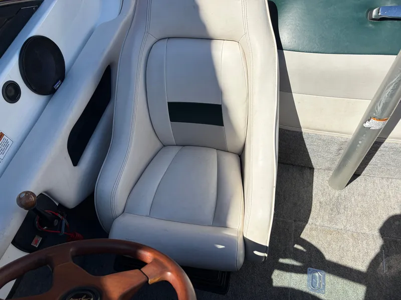 Slide: The Image of Interior of a 1997 MasterCraft Prostar 205 boat with leather seat. - 8
