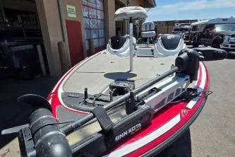 Slide: The Image of 2019 Nitro Z19 Pro fishing boat with trolling motor, parked outdoors. - 4