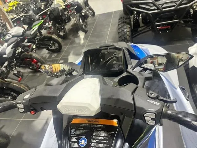 Slide: The Image of Handlebars of 2026 Kawasaki Jet Ski® STX® 160 X in a showroom. - 13