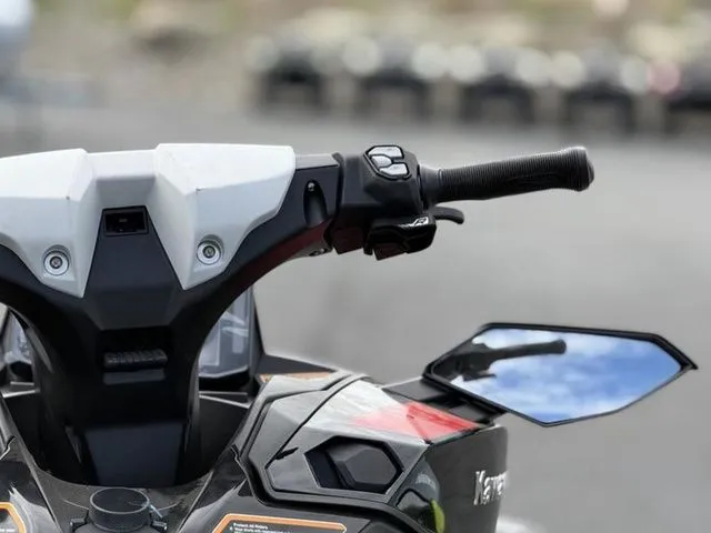 Slide: The Image of Close-up of Kawasaki Ultra 160 jet ski handlebars, 2026 model. - 23
