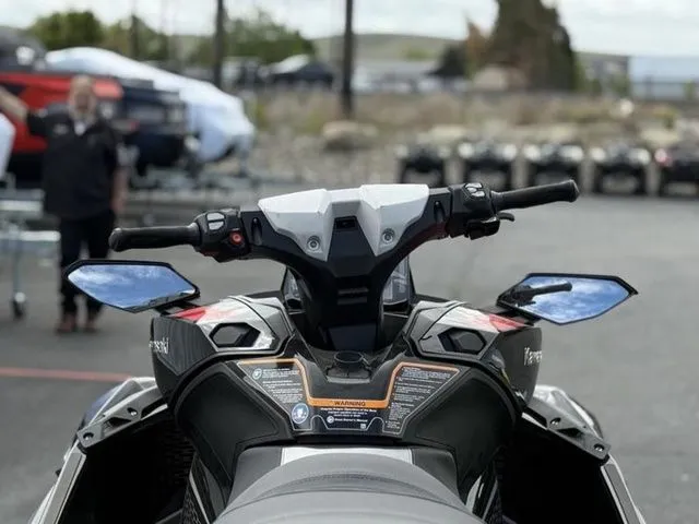 Slide: The Image of Kawasaki Ultra 160 2026 jet ski cockpit view outdoors. - 26