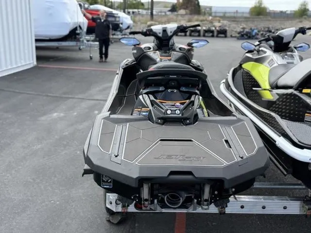 Slide: The Image of 2026 Kawasaki Ultra 160 jet ski parked on a trailer. - 5
