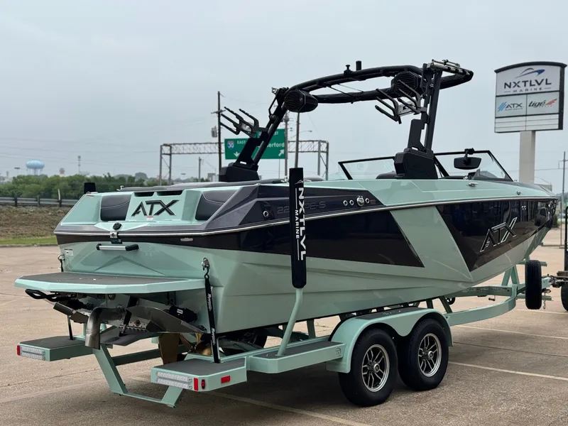 Slide: The Image of 2026 ATX Surf Boats 22 Type-S on trailer, side view. - 5