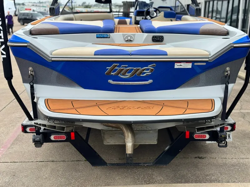Slide: The Image of Rear view of a 2018 Tigé R23 boat on a trailer. - 4