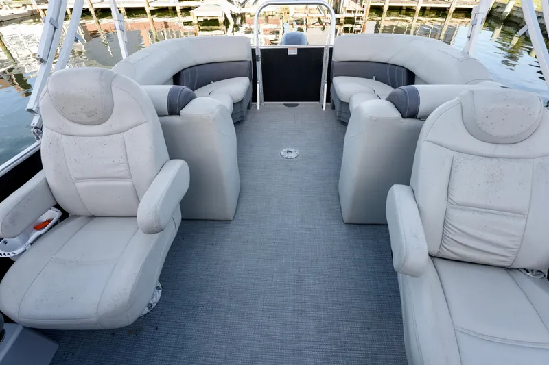 Slide: The Image of 2020 Sylvan Mirage 8522 Cruise pontoon boat interior with plush seating and spacious layout. - 7
