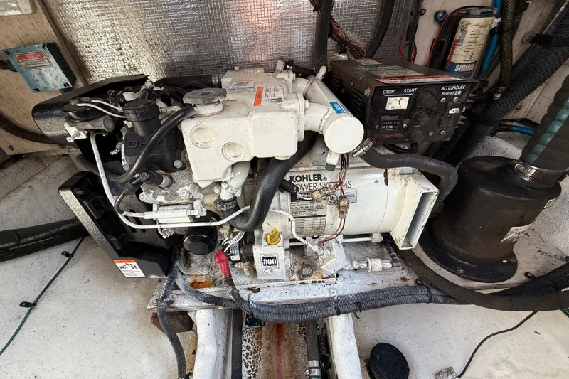 Slide: The Image of Engine compartment of a 2005 Sea Ray 290 Amberjack with Kohler power systems. - 16