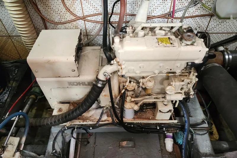 Slide: The Image of Engine room of a 1988 Marine Trader 43 with Kohler generator. - 29