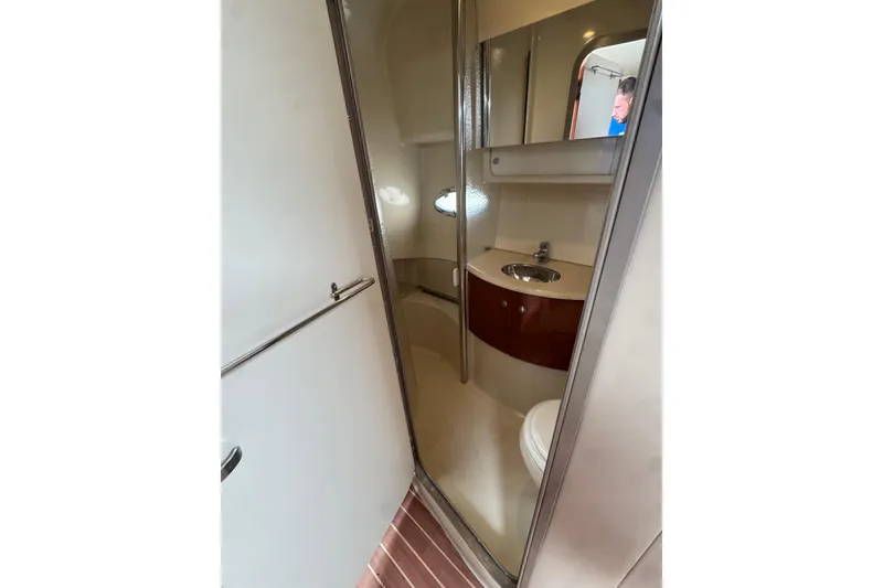 Slide: The Image of 2006 Formula 40 Performance Cruiser bathroom with sink, mirror, and toilet. - 40