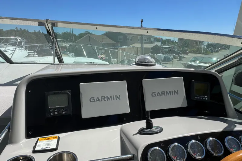 Slide: The Image of Dashboard of a 2006 Formula 40 Performance Cruiser with Garmin navigation systems. - 48