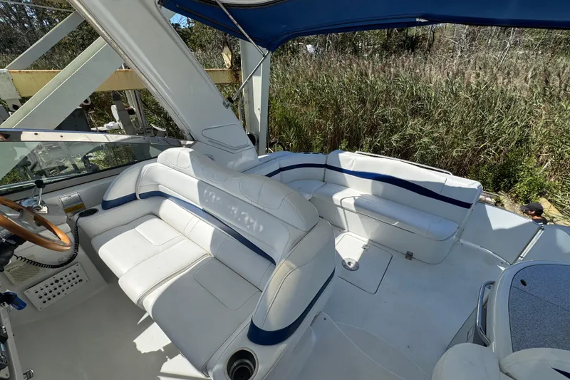 Slide: The Image of 2006 Formula 40 Performance Cruiser interior with white seating and blue accents. - 50